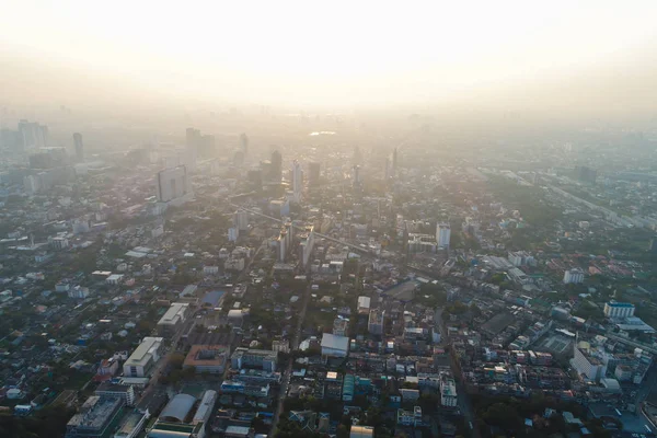 City building with road aerial view in sunset, Bangkok Thailand