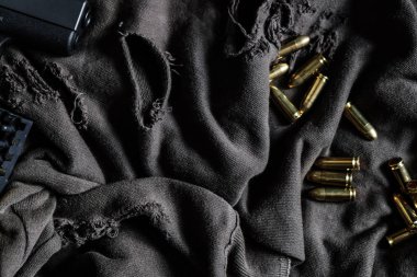 Gömlekli 9mm ruger kurşun bez doku kol nesne üzerinde