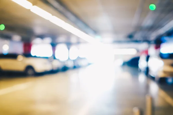 Blurred parking indoor of super store modern trade transport background