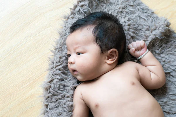 Adorable Baby Boy Lying Sheep Skin Wood Background Newborn Concept — Stock Photo, Image