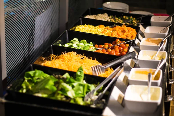 Colorful fresh salad bar healthy food in restaurant of hotel