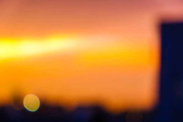 Blurred city sunset building colorful sky business background