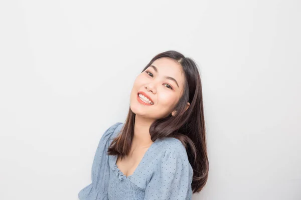 Happy young smiling asian women on white background — Stock Photo, Image