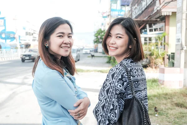 City lifestyle asian smiling women walking in city