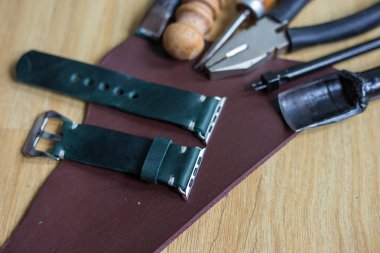 Vegetable tanned leather watch strap working clipart