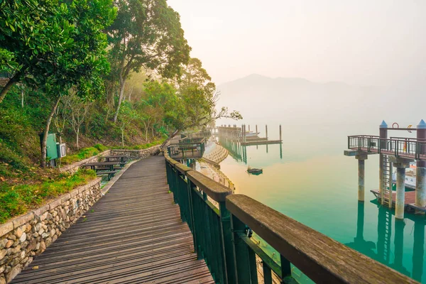 Sun moon lake in morning blue sky with fog — Stock Photo, Image