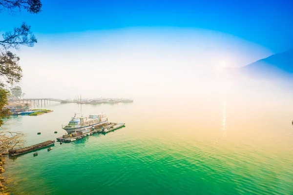 Sun moon lake in morning blue sky with fog — Stock Photo, Image