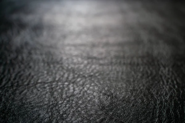 黑牛皮皮革纹理选择性焦点放产品 — 图库照片