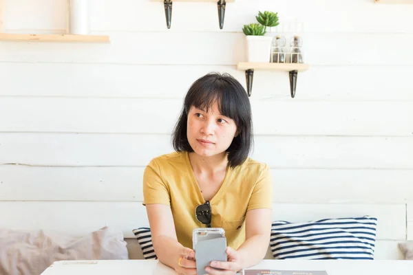 Business asian casual women use smartphone