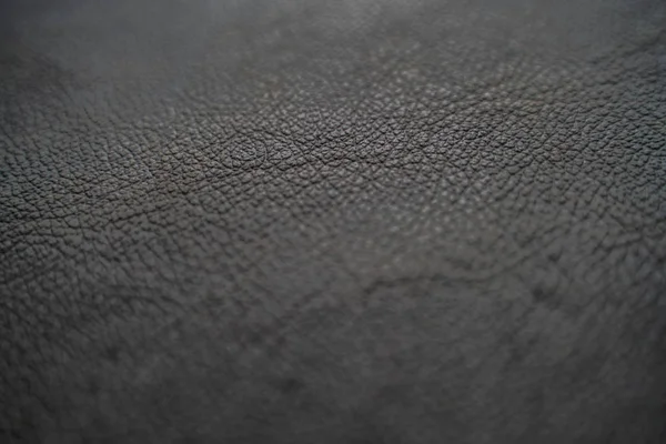 Textura de couro de vaca preta de grão integral genuíno — Fotografia de Stock