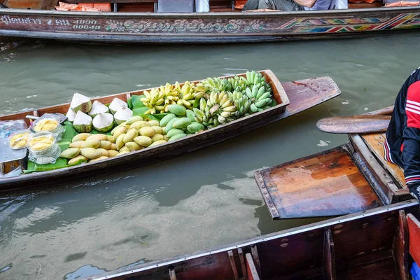 Fruit and local food sell on boat at floating  market