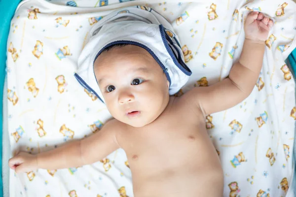 Adorable innocence baby boy lying on blanket — Stock Photo, Image