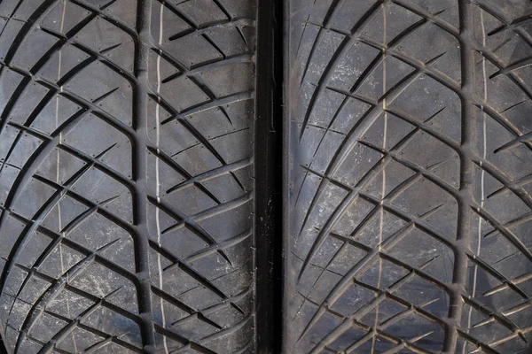 Nova textura pneu borracha carro preto — Fotografia de Stock