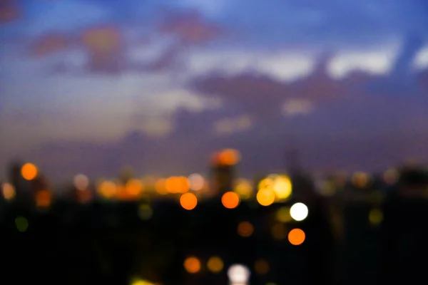 Blurred colorful sunset sky cloud with city building — Stock Photo, Image