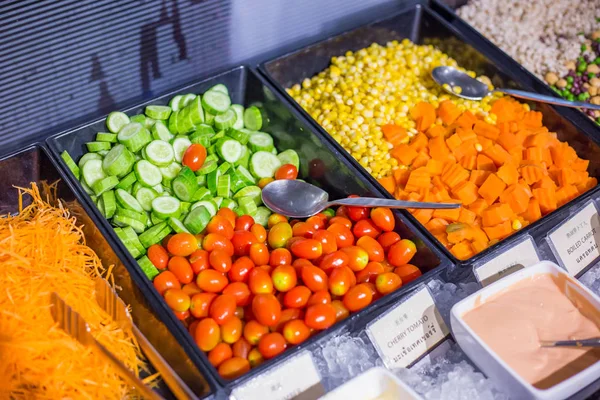Colorful fresh vegetable salad bar with homemade sauces dressing — Stock Photo, Image