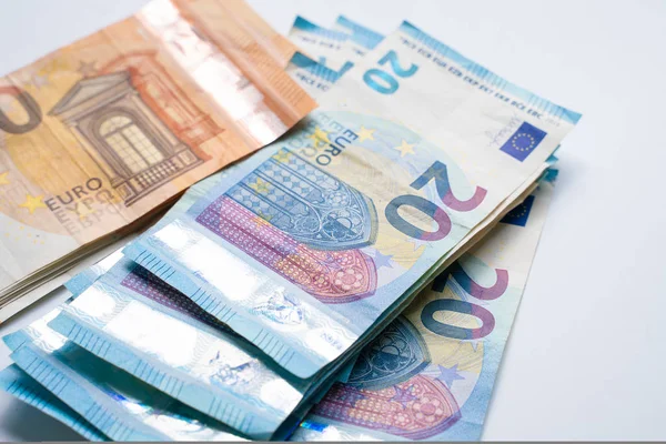Euro money pile spread su sfondo bianco — Foto Stock