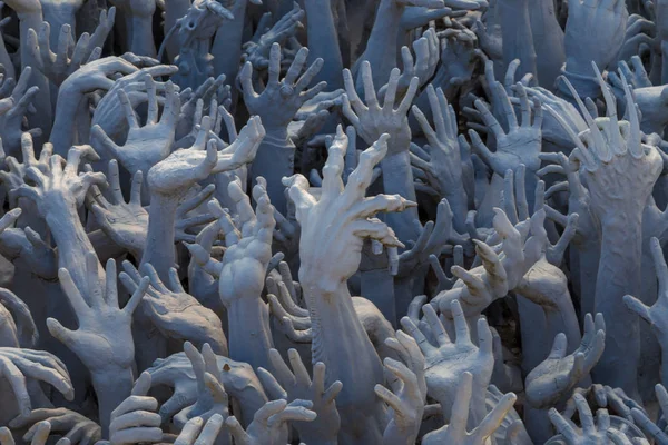 Sculpture of many hand from hell — Stock Photo, Image