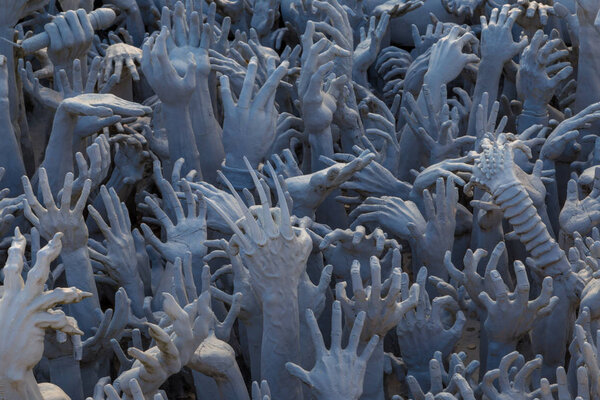 Sculpture of many hand from hell 