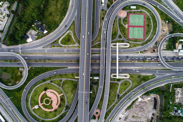 Aerial view transport junction road with satadium green park — Stock Photo, Image