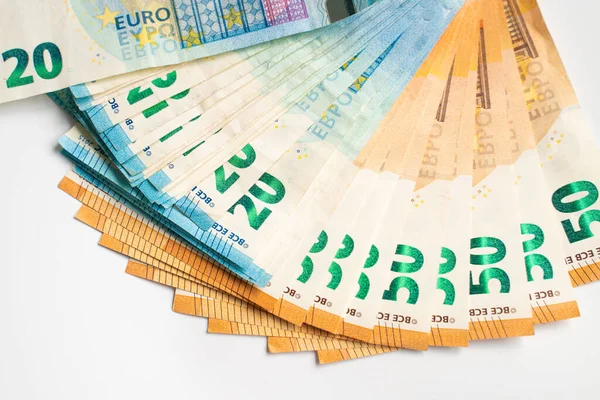 Euro zone money note spread on white background bundle of EU money
