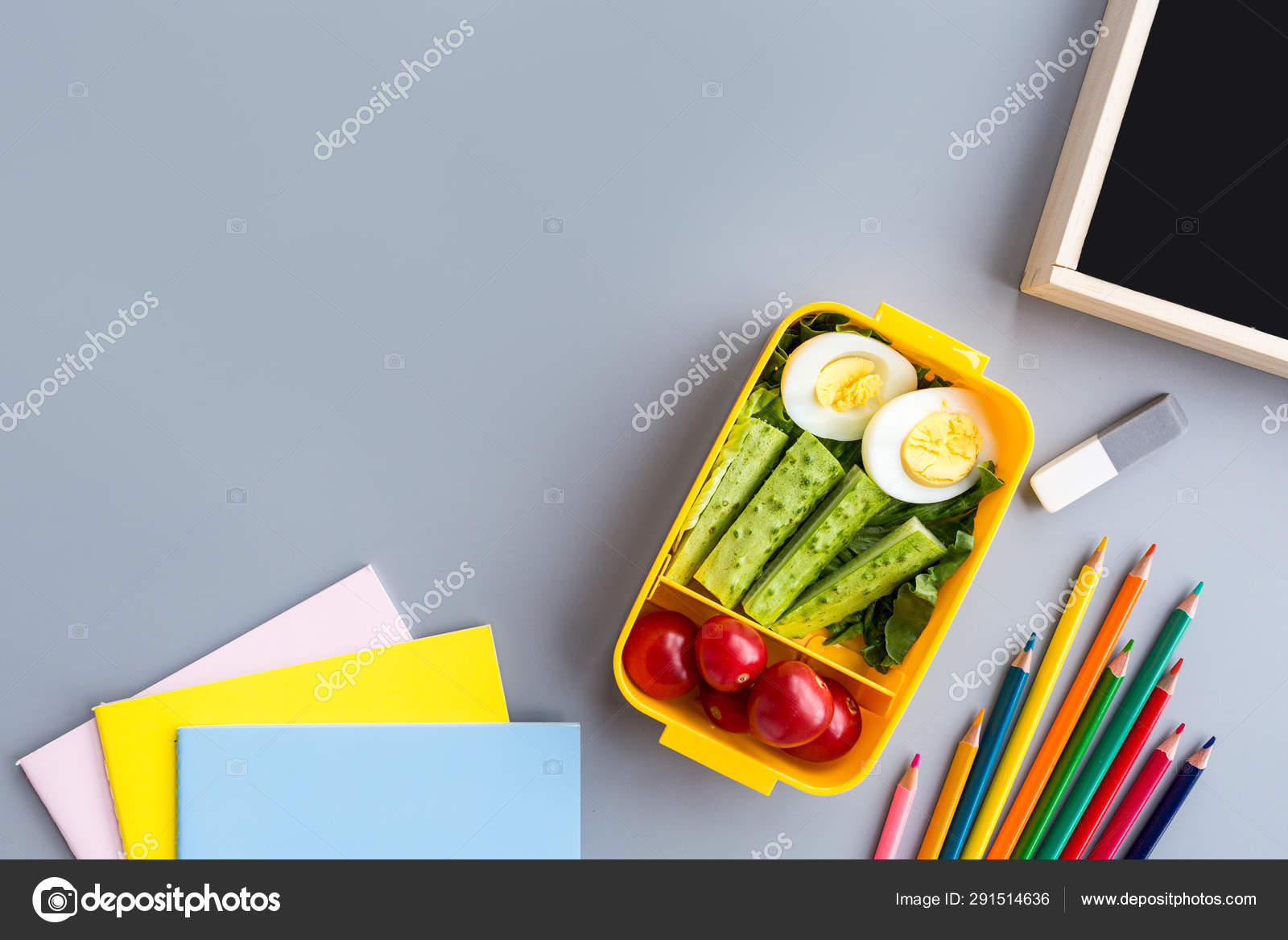 https://st4.depositphotos.com/24303524/29151/i/1600/depositphotos_291514636-stock-photo-school-supplies-and-lunch-box.jpg