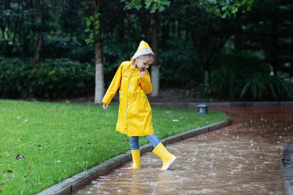 Cute Little Girl Yellow Raincoat Rubber Boots Walking Outdoor Rain — Stock Photo, Image