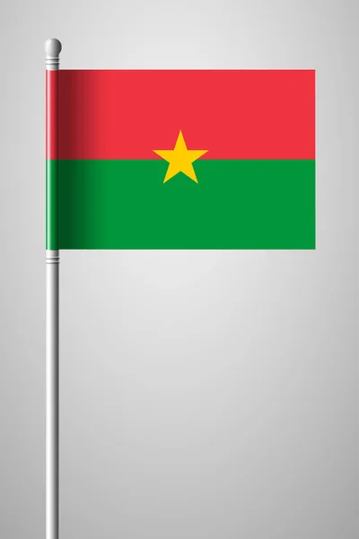 Vlag van Burkina Faso. Nationale vlag op vlaggenmast. Geïsoleerde illust — Stockvector