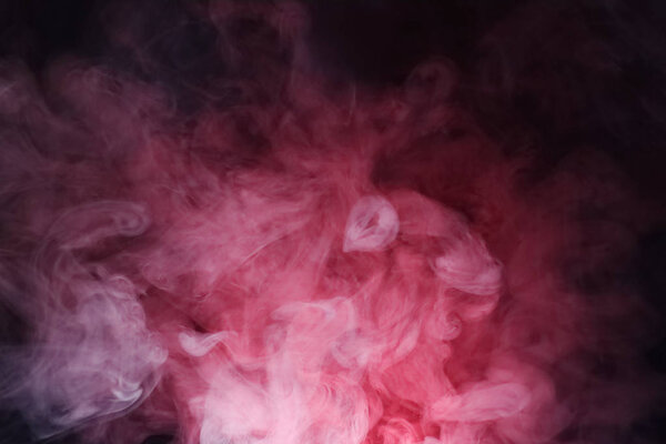 Background of abstract colored smoke. Star nebulae, star clusters, a bright flash of a nuclear explosion, a blazing fire.