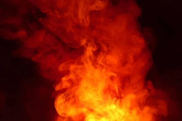 Imitation of bright flashes of orange-red flame. Background of abstract colored smoke. — Stock Photo, Image