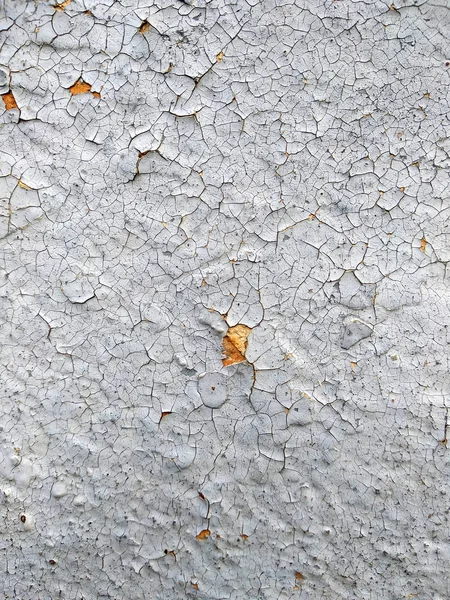 Antigua pared agrietada con quemado en el sol y pelar capas de pintura —  Fotos de Stock