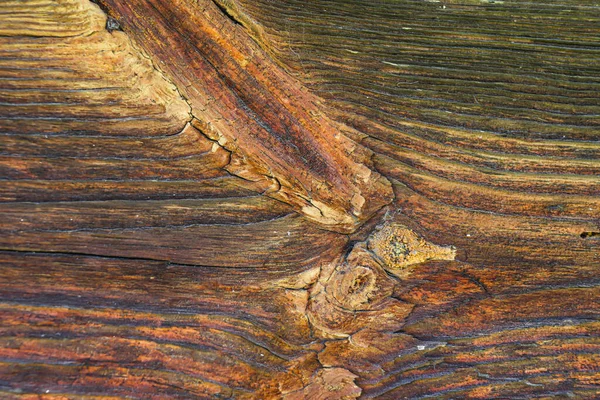 Madera quemada al sol, envejecida por el viento y el tiempo. — Foto de Stock