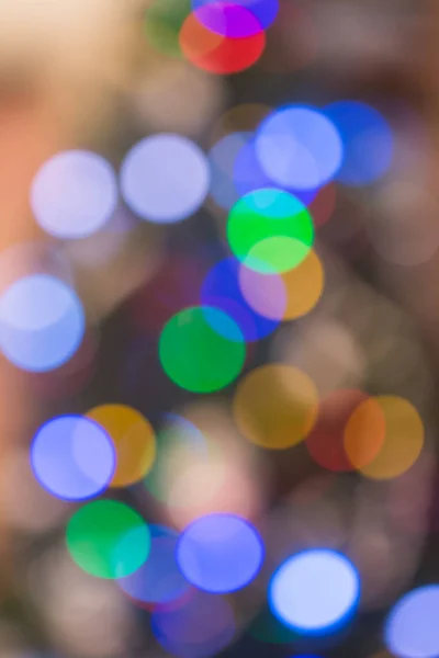 概要クリスマス背景としてぼやけた色の光 — ストック写真