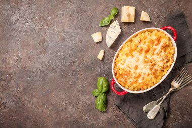 Mac and cheese, american style macaroni pasta in cheesy sauce clipart