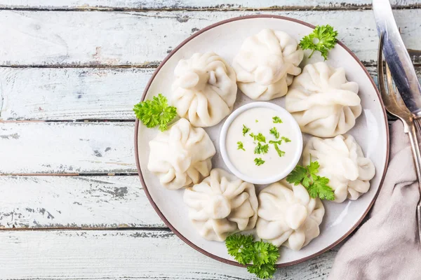 Georgian Dumplings Khinkali Meat Greens Sauce White Plate Top View — Stock Photo, Image