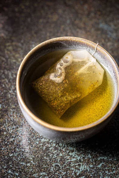 Tea bag in a cup — Stock Photo, Image