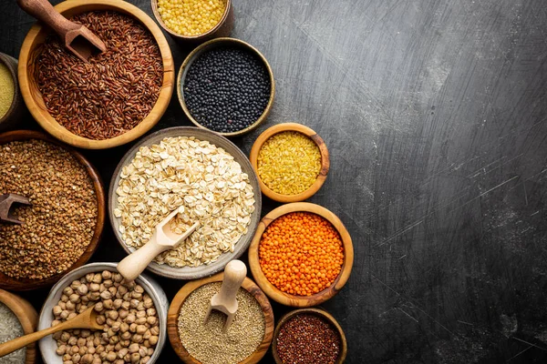 Bowls with different grains — Stock Photo, Image