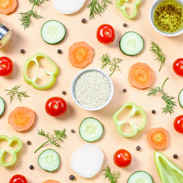 Salad ingredients layout. Food pattern with cherry tomatoes, carrot, cucumbers, radish, greens, pepper and spices