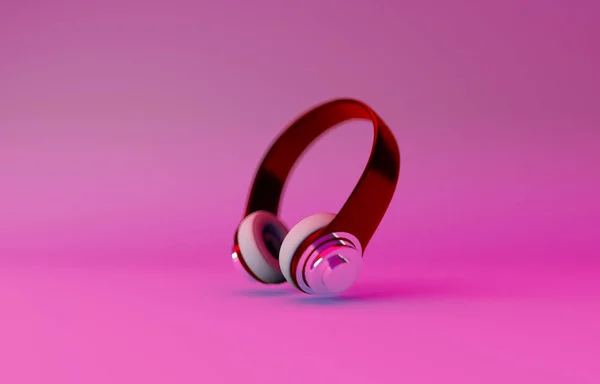 红色耳机位于粉红色背景上 — 图库照片