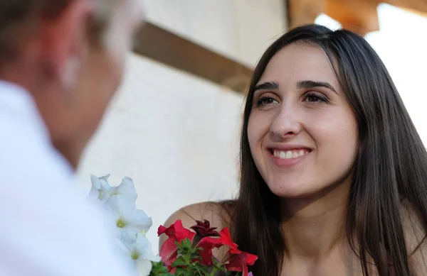 The girl carefully listens to the interlocutor. Attentive listener.customer is always right. customer is always satisfied.nice evening in good company.couple sitting at the table