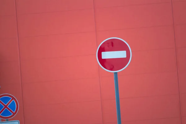 no traffic sign on red wall background