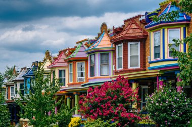 Colorful row houses on Guilford Avenue, in Baltimore, Maryland clipart