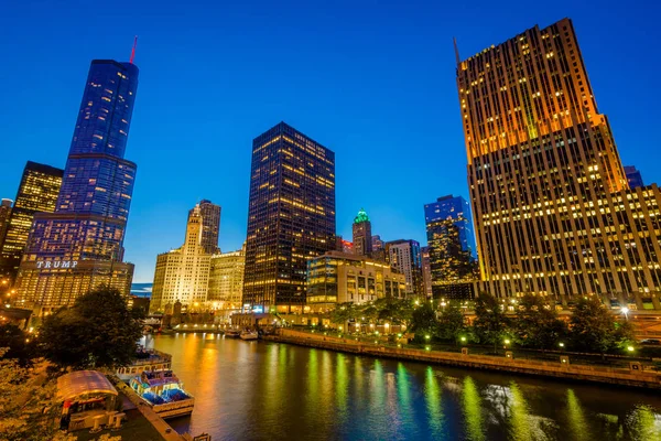 The Chicago River at night, in Chicago, Illinois