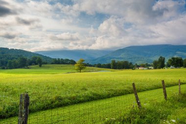 View of a farm and mountains in the rural Potomac Highlands of West Virginia. clipart