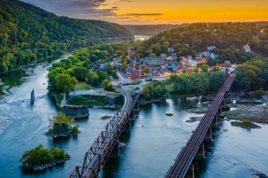 A sunset view from Maryland Heights, overlooking Harpers Ferry, West Virginia. clipart