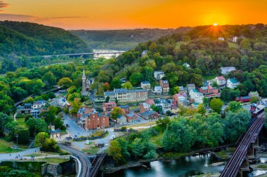A sunset view from Maryland Heights, overlooking Harpers Ferry, West Virginia. clipart