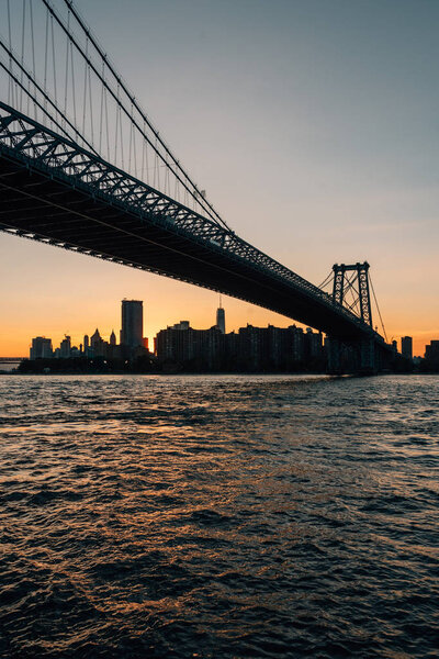 The Williamsburg Bridge at sunset, in Brooklyn, New York City