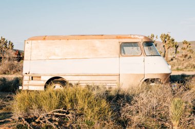 Abandoned van in Pioneertown, California clipart