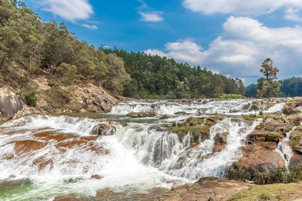 Water flow at Pykara waterfall, Ooty, India - March 14, 2016: Pykara waterfalls flows through Murkurti, Pykara and Glen Morgan dams
