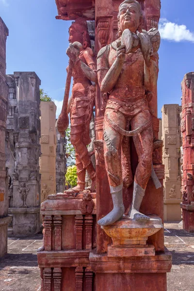 Close up view of sculptures of man playing a drum (thavil in tamil), playing a Shehnai (Nadaswaram in tamil), riding a horse, and an ancient woman greeting,Chennai India, Jan 29 2017 With copy space.