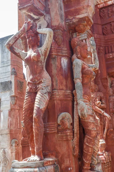 Close up view of sculptures of man playing a drum (thavil in tamil), playing a Shehnai (Nadaswaram in tamil), riding a horse, and an ancient woman greeting,Chennai India, Jan 29 2017 With copy space.